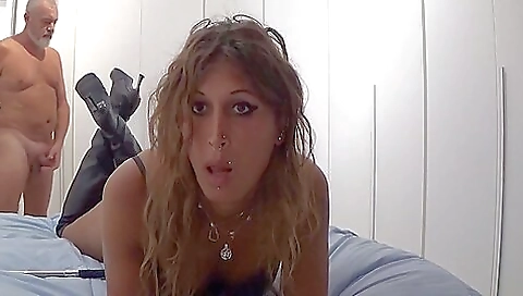Blonde lady plays with her sexy heels in a hardcore porn video