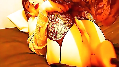 Sexy brunette with a beautiful ass is playing with a fuck machine