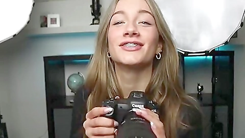 Sexy beauty in a costume blows the wonder queen out