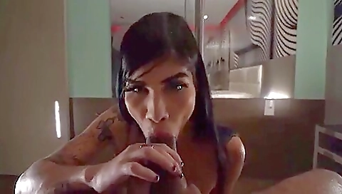 Brunette with tattooed pussy sucks and fucks a man